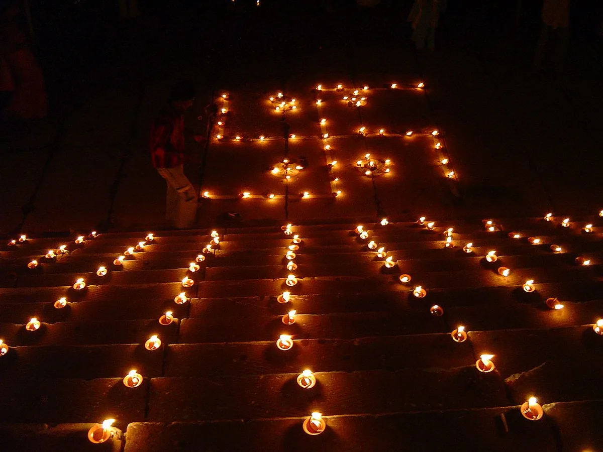 Dev Deepawali illuminations and flower offerings on the Ganges at Varanasi